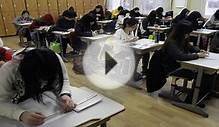 With jobs scarce, South Korean students linger on campus